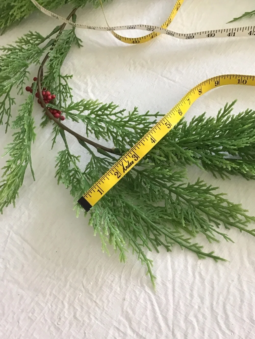 Ashland Green Cedar Garland with Red Berry Accents